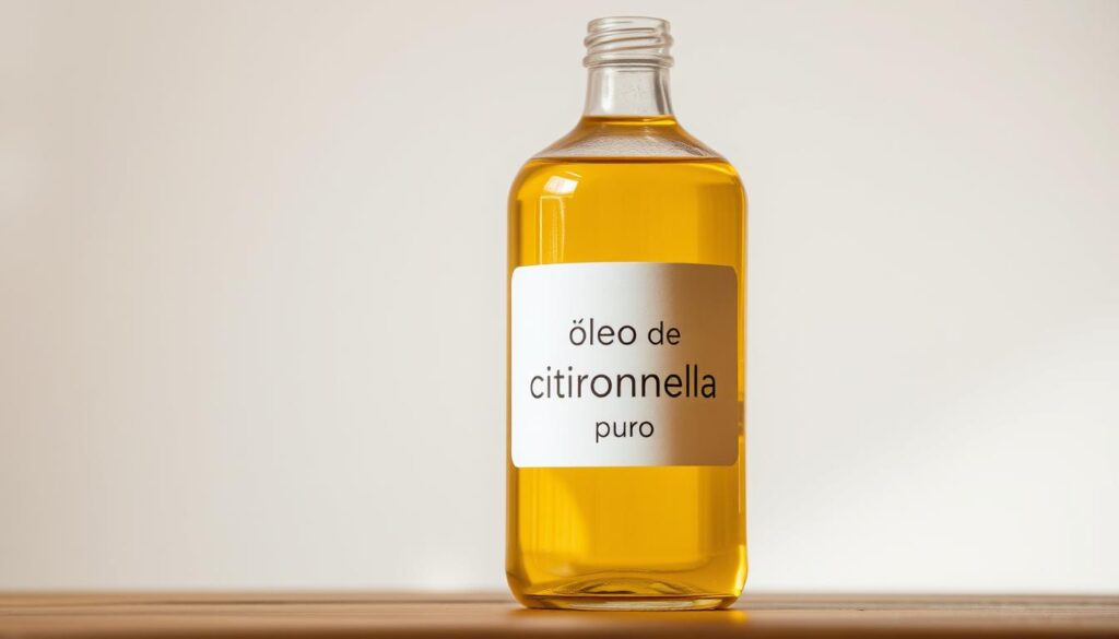 A glass bottle filled with pure, golden-yellow citronella essential oil sits atop a wooden table. The bottle's label displays the Portuguese text "óleo de citronela puro". Soft, warm lighting from an unseen source illuminates the bottle, creating subtle shadows and highlights that accentuate the liquid's viscosity and transparency. The background is a clean, uncluttered white, allowing the citronella oil to be the focal point. The overall scene conveys a sense of purity, simplicity, and the natural essence of the citronella plant.